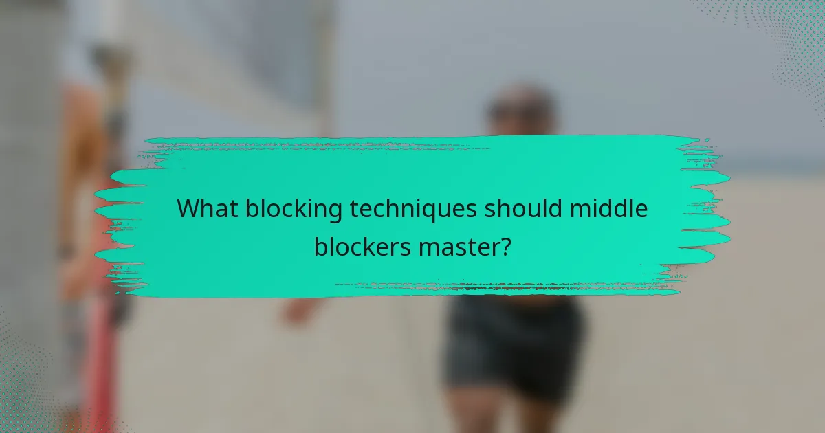 What blocking techniques should middle blockers master?